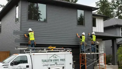 Professional vinyl siding installers working on home exterior in Portland OR